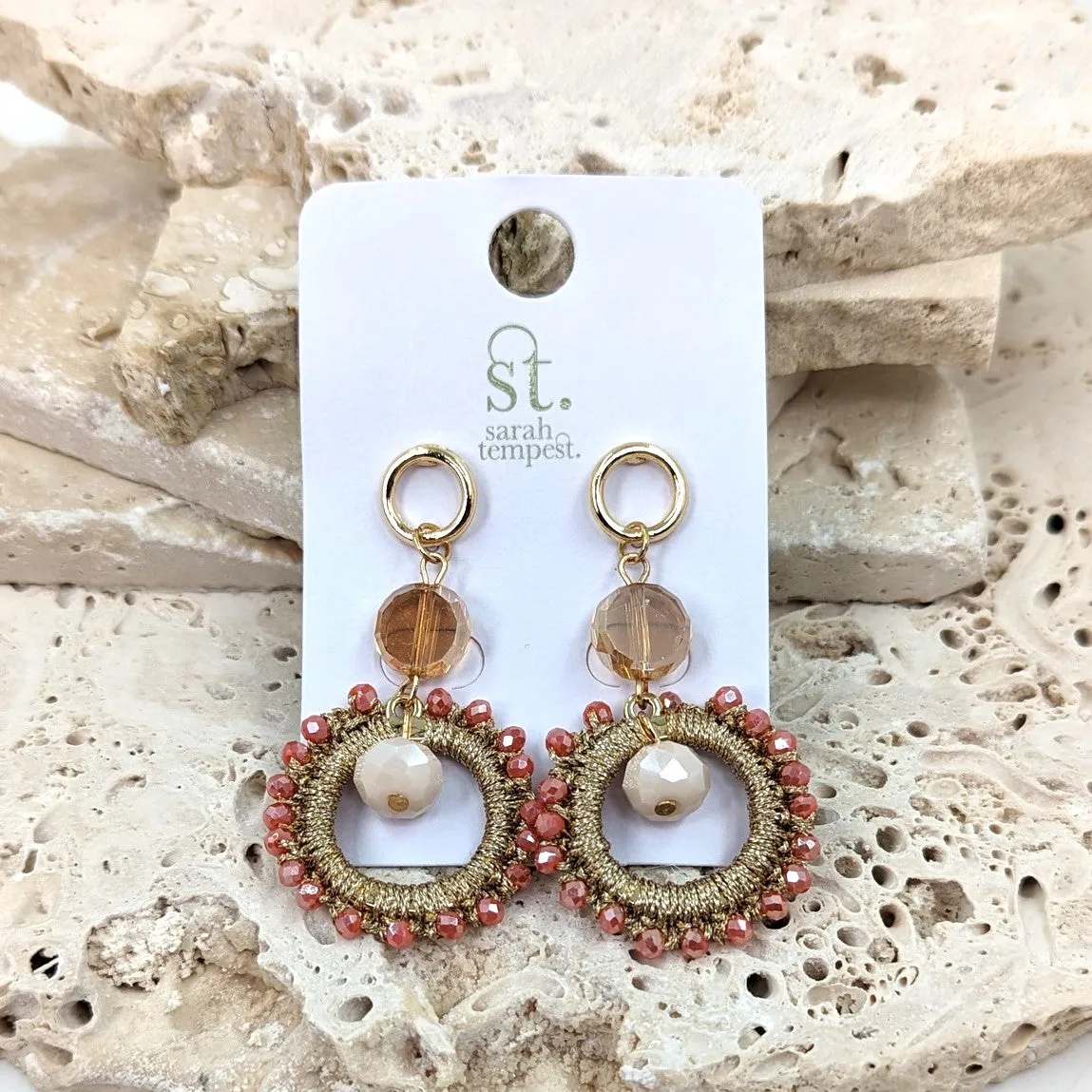 Dangle earrings with beaded ring